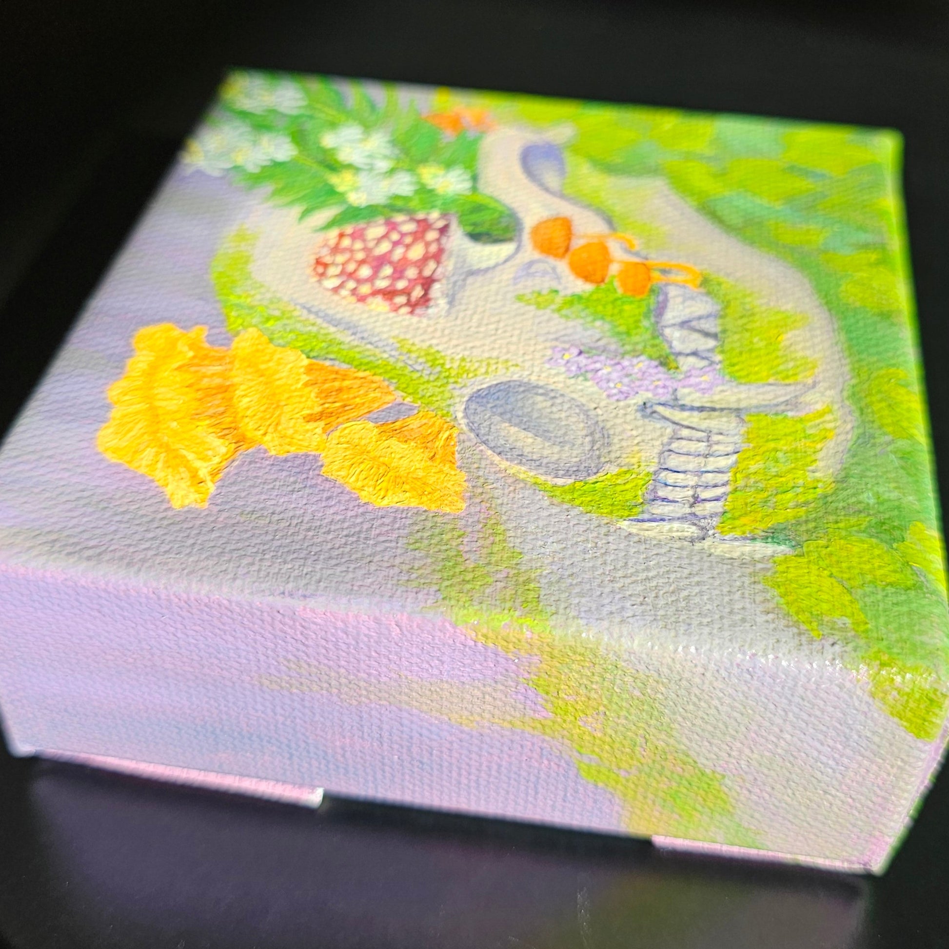 Colorful painting of a racoon skull blooming with funghi and flora from the Pacific Northwest.