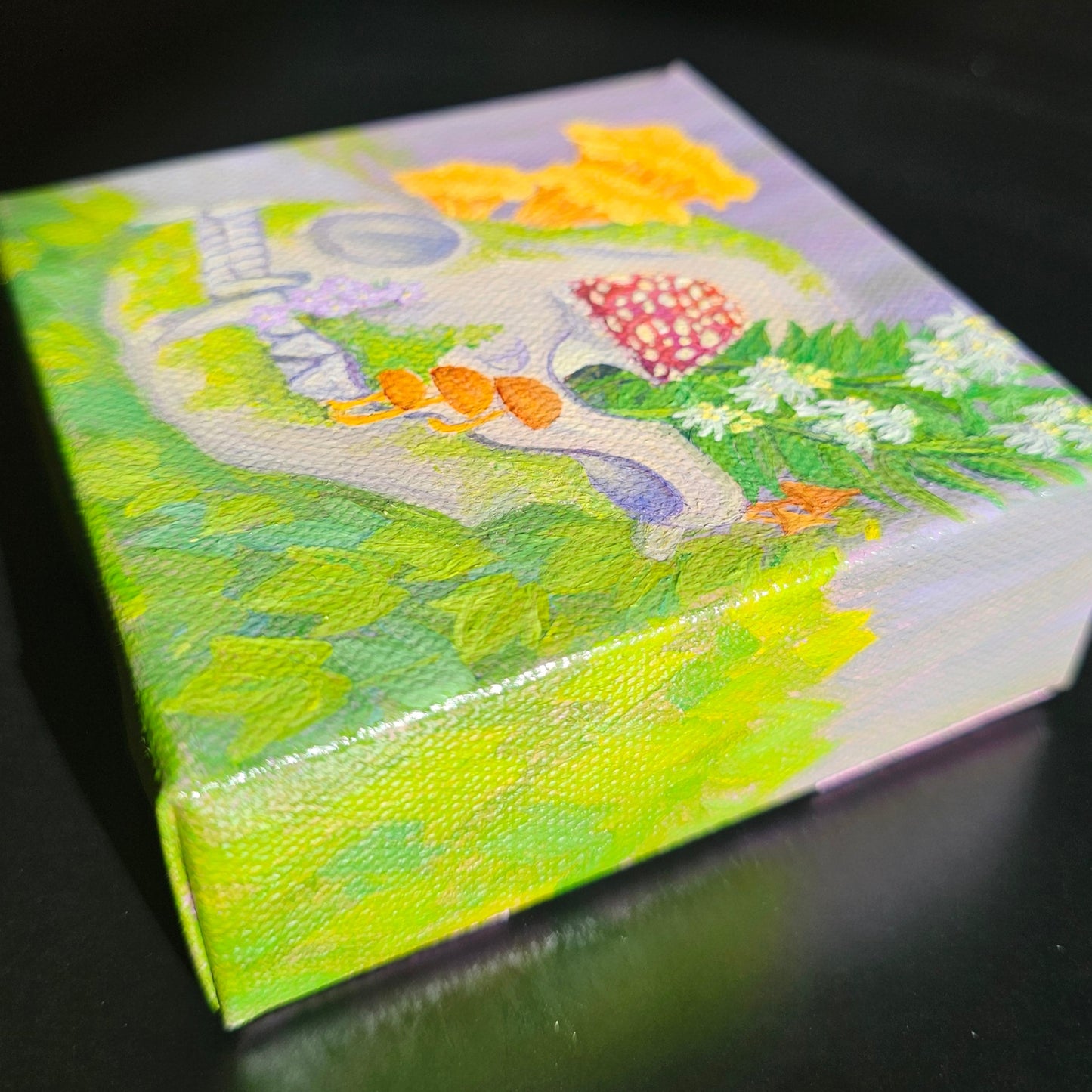 Colorful painting of a racoon skull blooming with funghi and flora from the Pacific Northwest.